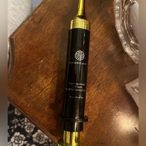 Unopened diamond infused/ 24K gold instant tightening complex.